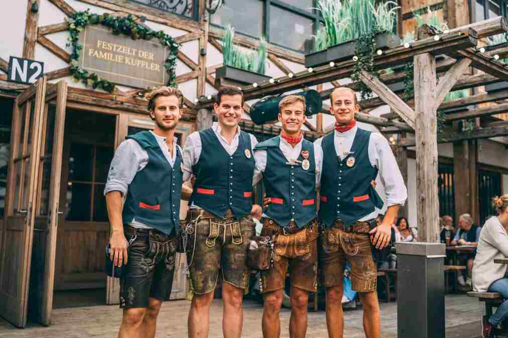 Oktoberfest Galley four person standing with traditional  dress 