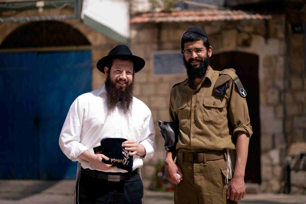 two  Jew men standing 